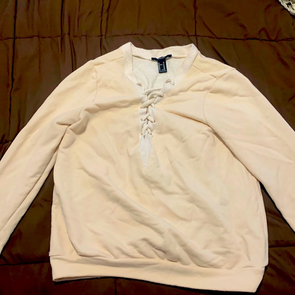 Pale yellow forever 21 crew neck with tie detailing in the front